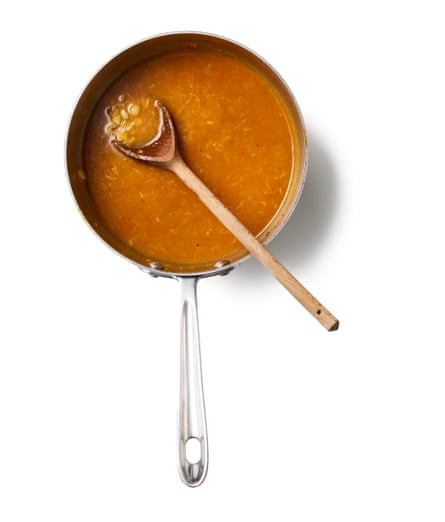 Felicity Cloake’s rasam 02e. Stir in the turmeric, pepper and a good pinch of salt, cook for just 30 seconds, then add the dal and its cooking water, as well as another 400ml water, or enough to make a thin broth. Bring to a simmer and add the tamarind paste – brands vary greatly in strength, so you may need to add more later. Simmer for five minutes, then take off the hob. This can be made in advance up to the tempering, which should be done just before serving.