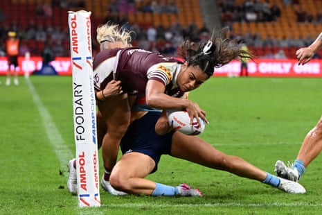 Teagan Berry makes a try-saving tackle on Jasmine Peters in the final minute.