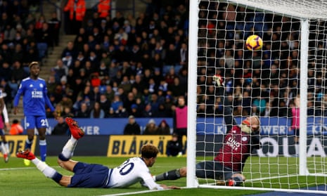 Dele Alli dives ho head in Tottenham’s second goal at Leicester.