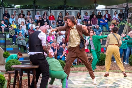 Loose-limbed … Ethan Reid, centre, as Sherlock Holmes.