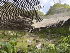 A photograph showing the damage done to the dish by a broken cable in August.