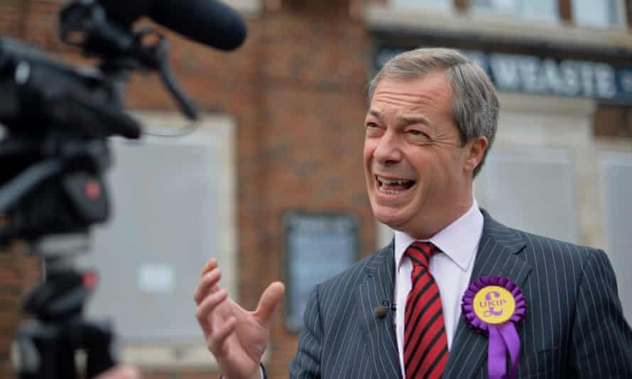 Nigel Farage on the local election campaign trail in 2013.