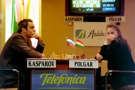 Polgár playing against Garry Kasparov.