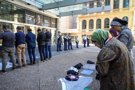 People praying as part of the pro-Palestine protests in Sydney yesterday.