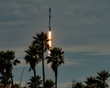 Rocket lifting off into the sky