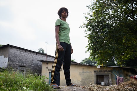Boxer Miki Ndaya outside her home in the neighbourhood of Messina, Kinshasa
