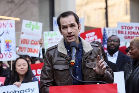 a man in front of a microphone