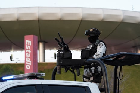 An armed guard outside Guadalajara’s Estadio Akron.