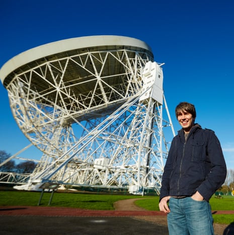 Professor Brian Cox stood outside at Jodrell Bank Observatory, Cheshire, UK.