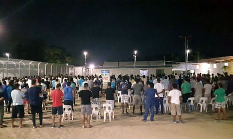 Refugees and asylum seekers holding a vigil for an asylum seeker who was found dead on Manus Island 