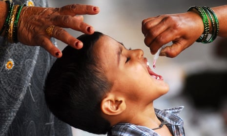 A boy in vaccinated for polio in Mumbai