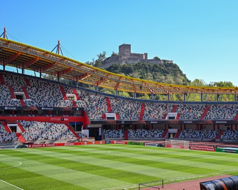 Estadio Municipal de Leiria's stands sit below a hilltop castle ahead of a Europa League match