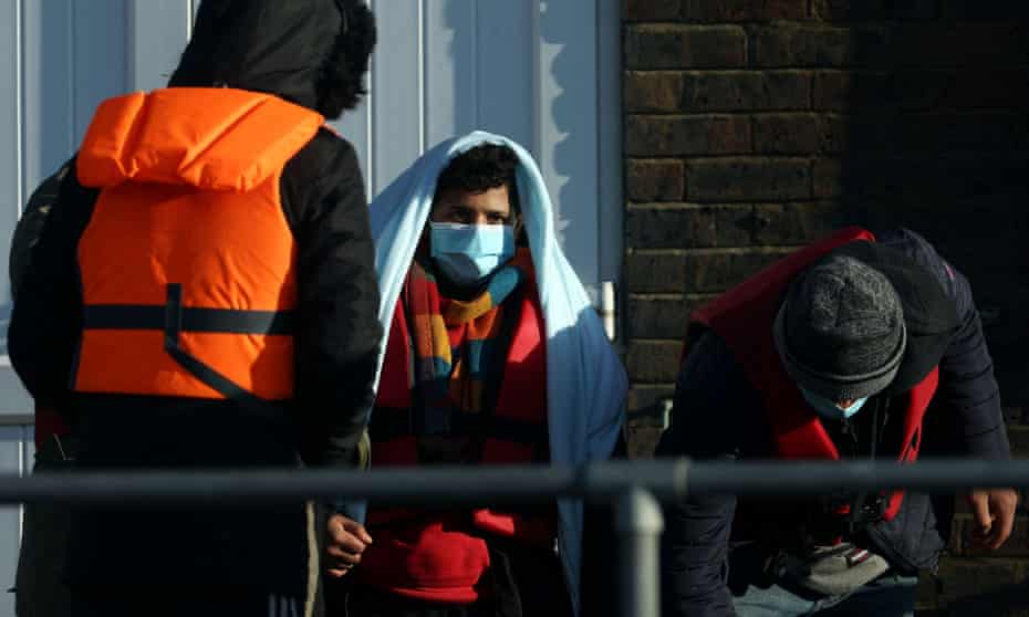Refugees in blankets