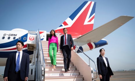 Rishi Sunak and his wife, Akshata Murty, arriving in Tokyo for the G-7 summit on 18 May.