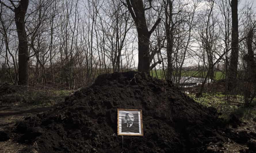 A portrait of Vladimir Lenin is used as a shooting target in a frontline village near Chuhuiv, Ukraine.