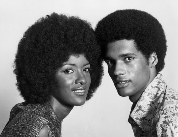 A studio portrait of an African American couple, taken in the mid-1970s. A studio portrait of an African American couple, taken in the mid-1970s.