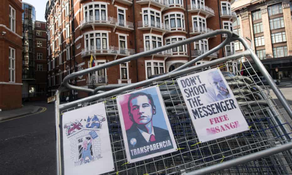 Signs outside the Ecuadorean embassy in London where Julian Assange is living.