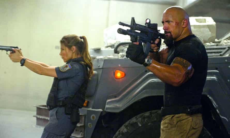 Elsa Pataky and Dwayne Johnson in the 2011 Fast Five: Fast &amp; Furious.