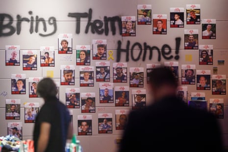 A wall with portraits of hostages on display during a press day prior to the opening of the Nova Music Festival exhibition at former Tempelhof airport in Berlin, Germany, on 06 October 2025.