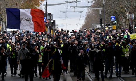 Protesters gather for a demonstration in Paris on Saturday