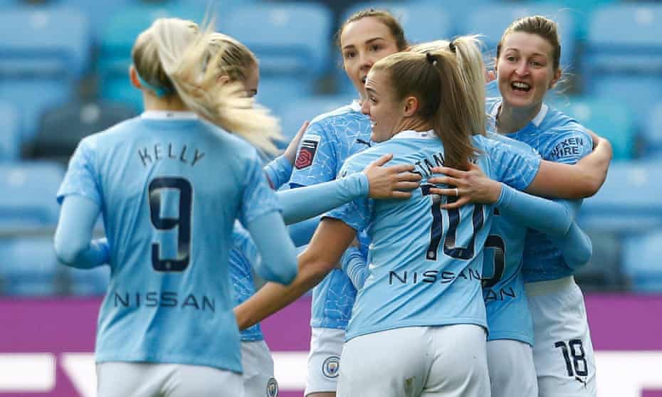 Ellen White is congratulated by her teammates after scoring Manchester City’s second goal