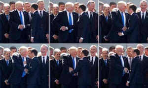 Donald Trump shakes hands with Emmanuel Macron