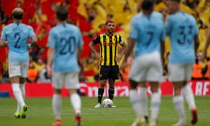 Watford captain Troy Deeney looks down on Manchester City's sixth goal.