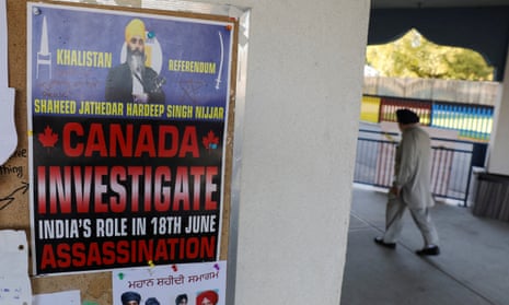 A sign asking for an investigation into India's alleged role in the killing of Sikh leader Hardeep Singh Nijjar in Canada.