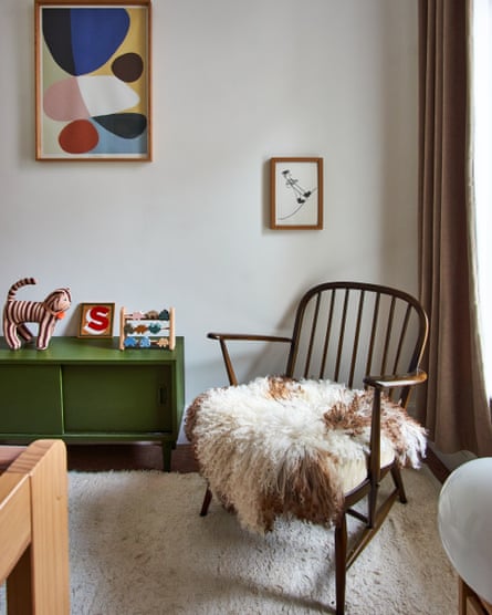 Kids’ stuff: artworks, toys and new linen curtains in the nursery.