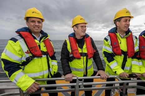 Ed Miliband (right) visiting a wind farm off the coast of Scotland with Keir Starmer and Anas Sarwar, the Scottish Labour leader (left), on Friday last week.