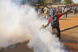 Supporters of opposition leader Hama Amadou protest in the street in Niamey