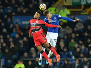 Huddersfield Town’s Elias Kachunga (left) and Everton’s Mason Holgate battle for the ball during Evertons 2 v 0 triumph at the Premier League match at Goodison Park.