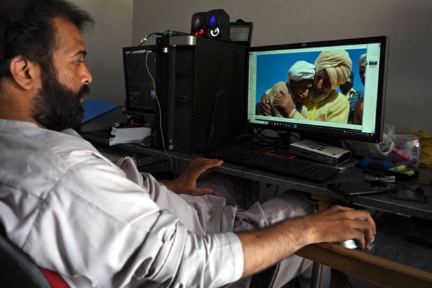 Muhammad Naveed at his computer