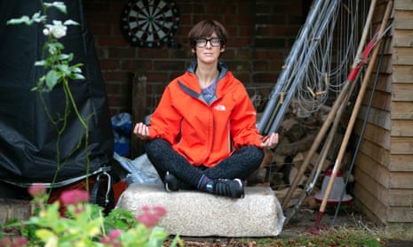 ‘My minds churns like a cement mixer’ … Emma Beddington tries early-morning meditation in her garden.