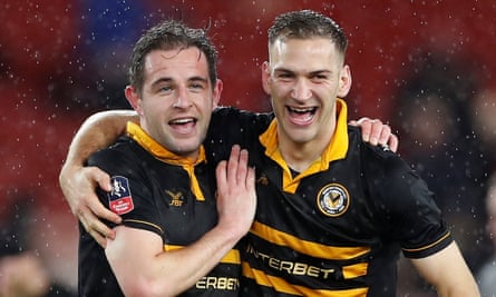 Matt Dolan (left) celebrates Newport’s draw against Middlesbrough.