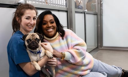 Battersea’s senior vet Megan Golding and Alison Hammond with pug Stan