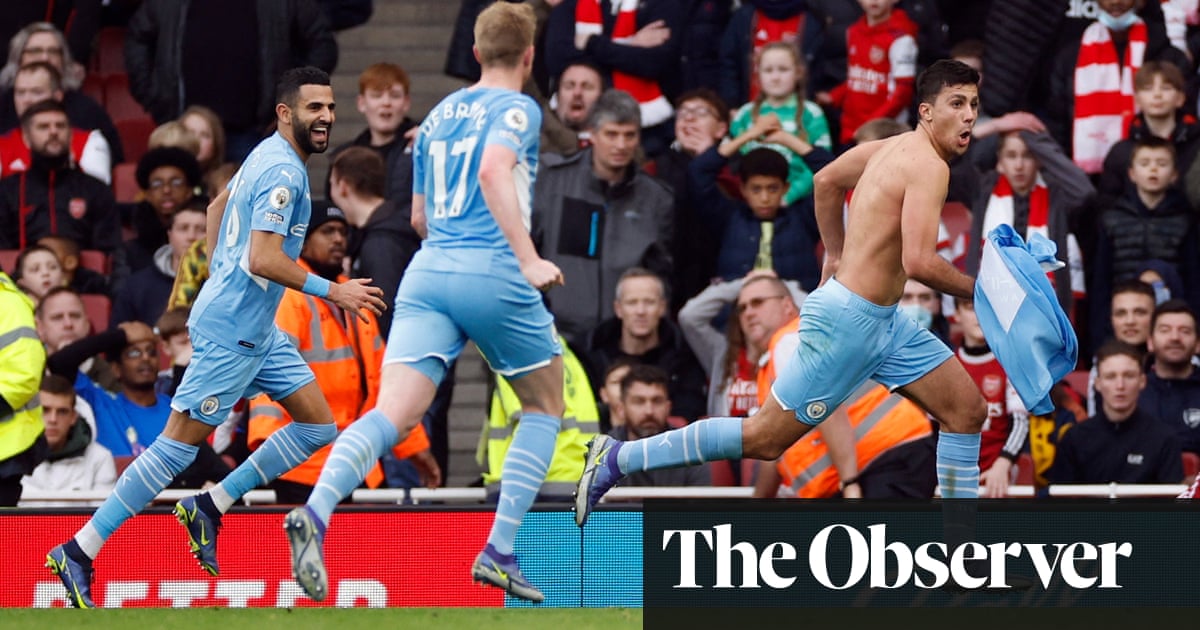 Rodri’s injury-time strike earns City win at 10-man Arsenal after VAR furore