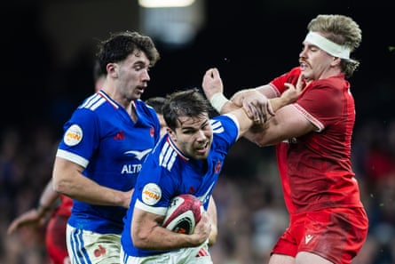Antoine Dupont with the ball for France against Wales
