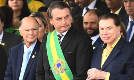 The church’s founder, Edir Macedo (left), with the then Brazilian president, Jair Bolsonaro, at an Independence Day parade in Brasilia in 2019.