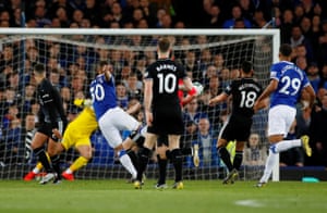 Richarlison’s shot deflects off Ben Mee for the opening goal.