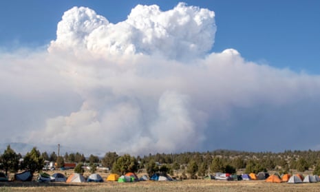 A pyrocumulus cloud drifts into the air north of the Bootleg fire forward operating base in Bly, Oregon.
