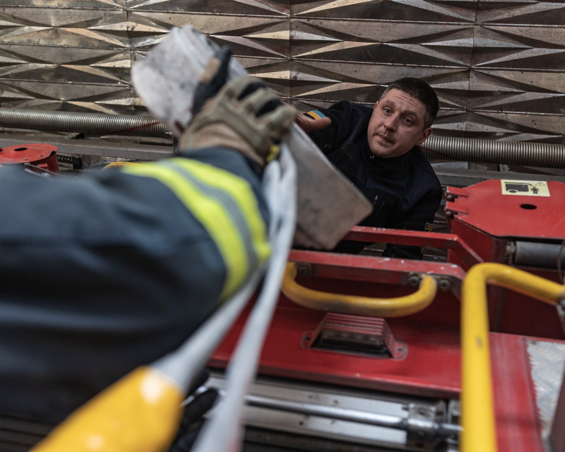 Ukranian firefighters clean up adter bombing