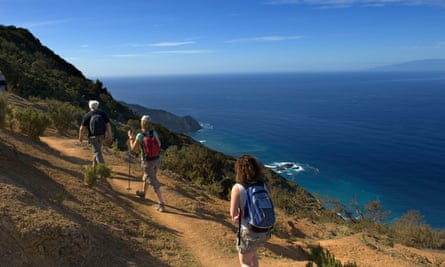 Tourist hiking on Vallehermoso trail; Island of La Gomera