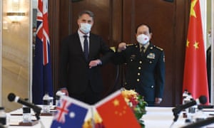 Australia's defence minister Richard Marles bumps elbows with China's defence minister Wei Fenghe on the sidelines of the Shangri-La Dialogue summit in Singapore.