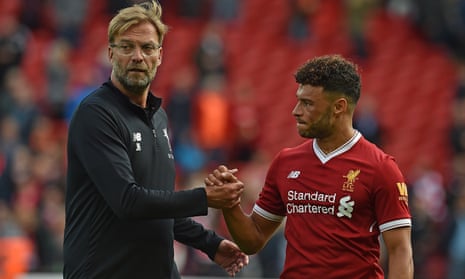 Jürgen Klopp (left) shakes hands with Alex Oxlade-Chamberlain after the 1-1 draw with Burnley at Anfield.