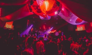 Crowds dance under the lights at club Sugarfactory, Amsterdam, the Netherlands.