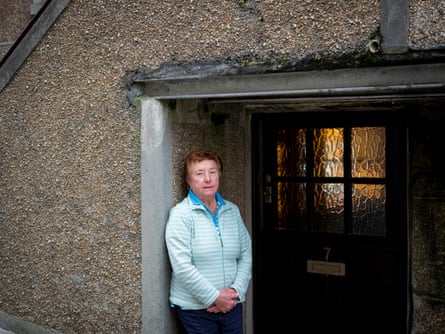Long-term resident Phyllis Rashleigh standing in a doorway in St Ives, Cornwall, UK