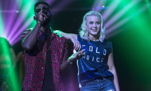 Larsson performing with Tinie Tempah.