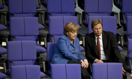 Westerwelle with Angela Merkel at the Bundestag, the lower house of parliament, in Berlin.