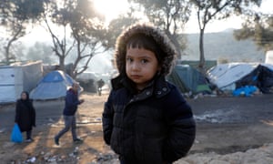 Greece/Lesbos/ Jan 12,2020.
A child poses for a photo at the makeshift camp set next to Moria, on the island of Lesbos, Greece.
Giorgos Moutafis for The Guardian